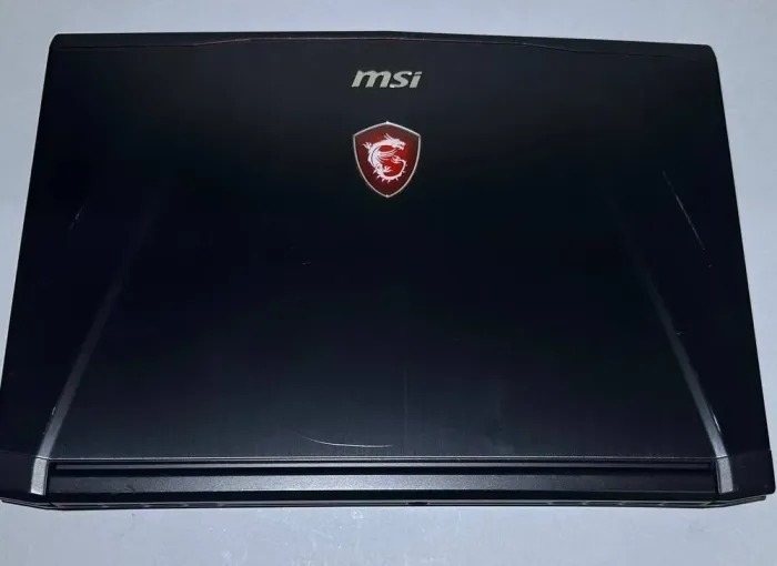 Ігровий ультрабук Б-клас MSI GS43VR 6RE Phantom Pro / 14.1" (1920x1080) TN / Intel Core i7-7700HQ (4 (8) ядра по 2.8 - 3.8 GHz) / 32 GB DDR4 / 256 GB SSD / nVidia GeForce GTX 1060, 6 GB GDDR5, 192-bit / WebCam / Win 11 б/в - зображення 3
