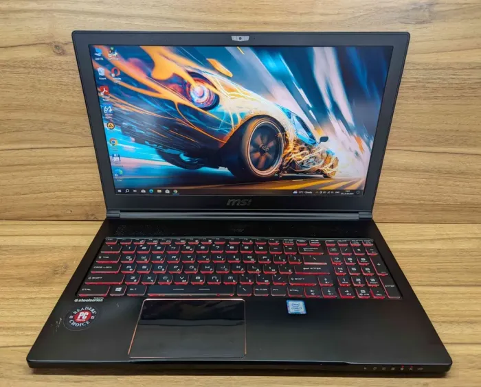 Мобільна робоча станція MSI WS63 / 15.6" (1920x1080) IPS / Intel Core i7-8750H (6 (12) ядер по 2.2 - 4.1 GHz) / 32 GB DDR4 / 1000 GB SSD / nVidia Quadro P3200, 6 GB GDDR5, 192-bit / WebCam / Windows 10 б/в - зображення 2