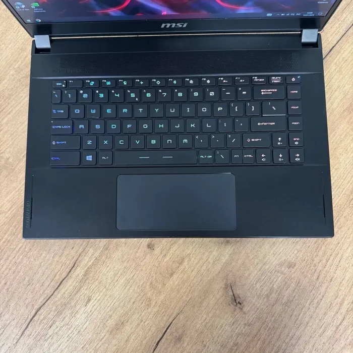 Ігровий ноутбук MSI GS66 Stealth 10SF / 15.6" (1920x1080) IPS / Intel Core i7-10750H (6 (12) ядер по 2.6 - 5.0 GHz) / 16 GB DDR4 / 512 GB SSD / nVidia GeForce RTX 2070, 8 GB GDDR6, 256-bit / WebCam б/в - зображення 7