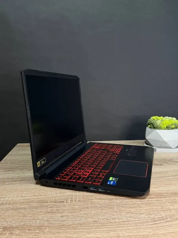 Ігровий ноутбук Б-клас Acer Nitro 5 / 15.6" (1920x1080) IPS / Intel Core i5-11400H (6 (12) ядер по 2.7 - 4.5 GHz) / 16 GB DDR4 / 512 GB SSD M.2 / nVidia GeForce RTX 3050, 4 GB GDDR6, 128-bit / WebCam / Win 11 б/в - зображення 4