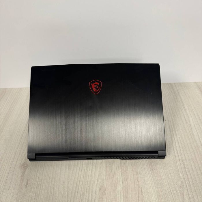 Ігровий ноутбук Б-класу MSI GF63 Thin 11UC / 15.6" (1920x1080) IPS / Intel Core i5-11400H (6 (12) ядер по 2,7 - 4,5 ГГц) / 16 ГБ DDR4 / 512 ГБ SSD NVMe / nVidia GeForce RTX 3050, 4 ГБ GDDR6, 128-bit / WebCam б/в - зображення 3