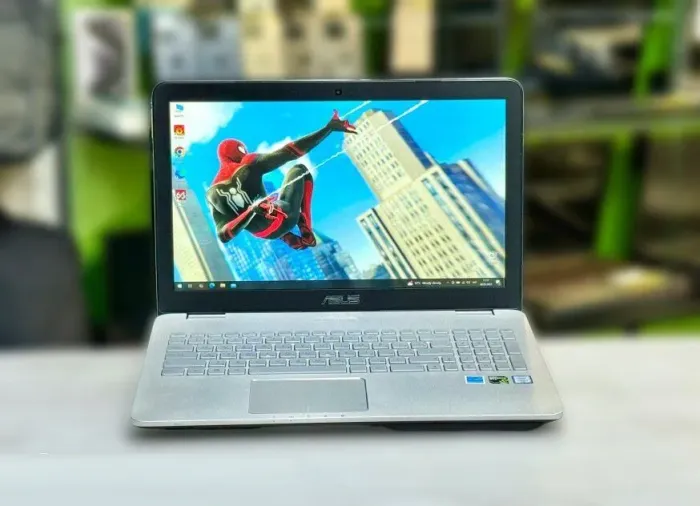 Ігровий ноутбук Б-клас Asus N551V / 15.6" (3840x2160) IPS / Intel Core i7-6700HQ (4 (8) ядра по 2.6 - 3.5 GHz) / 16 GB DDR4 / 128 GB SSD M.2 + 1000 GB HDD / nVidia GeForce GTX 960M, 4 GB GDDR5, 128-bit / WebCam / DVD-RW / Win 10 Home б/в - зображення 2