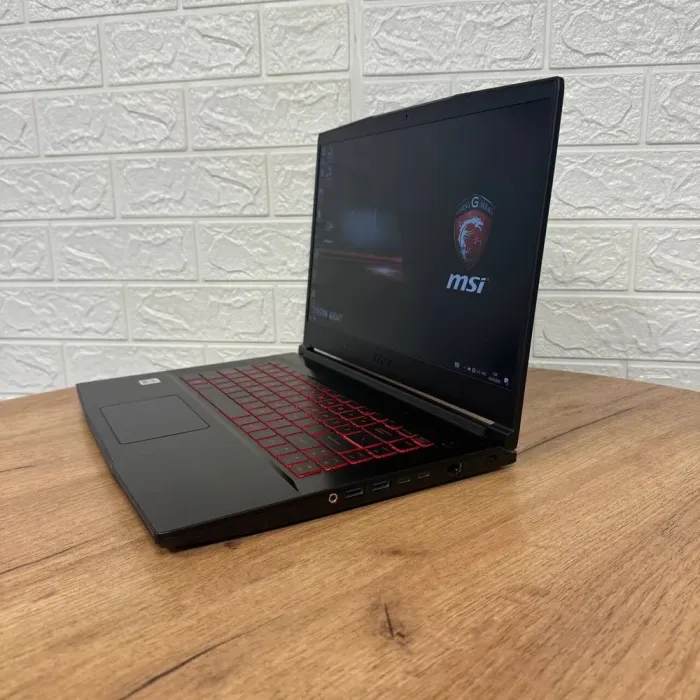 Ігровий ноутбук Б-клас MSI GF65 Thin 10UE / 15.6" (1920x1080) IPS / Intel Core i7-10750H (6 (12) ядер по 2.6 - 5.0 GHz) / 16 GB DDR4 / 512 GB SSD / nVidia GeForce RTX 3060, 6 GB GDDR6, 192-bit / WebCam б/в - зображення 5