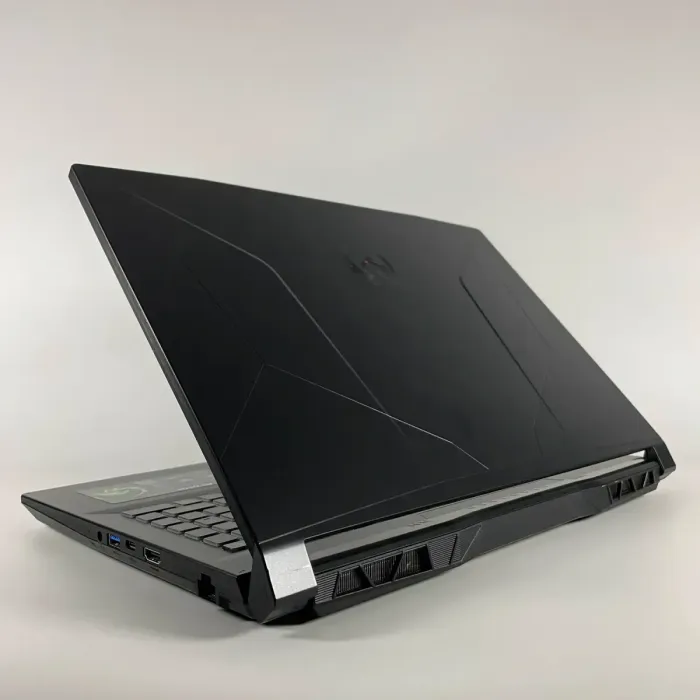 Ігровий ноутбук MSI Bravo 15 C7VE / 15.6" (1920x1080) IPS / AMD Ryzen 5 7535HS (6 (12) ядер по 3,3 - 4,55 ГГц) / 16 ГБ DDR5 / 512 ГБ SSD / nVidia GeForce RTX 4050, 6 ГБ GDDR6, 96-біт / WebCam б/в - зображення 7