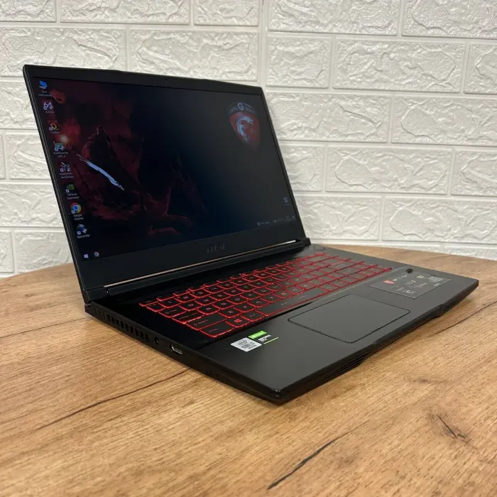 Ігровий ноутбук Б-клас MSI GF65 Thin 10SDR / 15.6" (1920x1080) IPS / Intel Core i7-10750H (6 (12) ядер по 2.6 - 5.0 GHz) / 16 GB DDR4 / 512 GB SSD / nVidia GeForce GTX 1660 Ti, 6 GB GDDR6, 192-bit / WebCam б/в - зображення 4