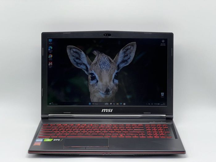 Ігровий ноутбук MSI GL63 8SE-054US / 15,6" (1920x1080) IPS / Intel Core i7-8750H (6 (12) ядер по 2,2 - 4,1 ГГц) / 16 ГБ DDR4 / 480 ГБ SSD / nVidia GeForce RTX 2060, 6 ГБ GDDR6, 192-біт / Веб-камера б/в - зображення 2