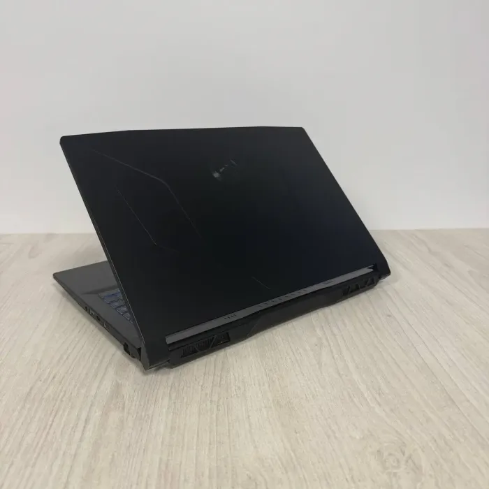 Ігровий ноутбук Б-класу MSI Bravo 15 C7VE / 15,6" (1920x1080) IPS / AMD Ryzen 5 7535HS (6 (12) ядер по 3,3 - 4,55 ГГц) / 16 ГБ DDR5 / 512 ГБ SSD / nVidia GeForce RTX 4050, 6 ГБ GDDR6, 96-біт / WebCam б/в - изображение 8