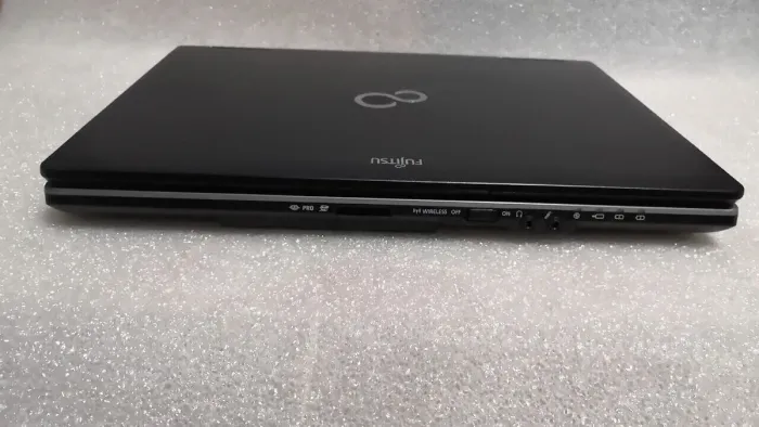 Ноутбук Fujitsu Lifebook S752 / 14" (1366x768) TN / Intel Core i5-3210M (2 (4) ядра по 2.5 - 3.1 GHz) / 4 GB DDR3 / 500 GB HDD / Intel HD Graphics 4000 / DVD-ROM б/в - зображення 6