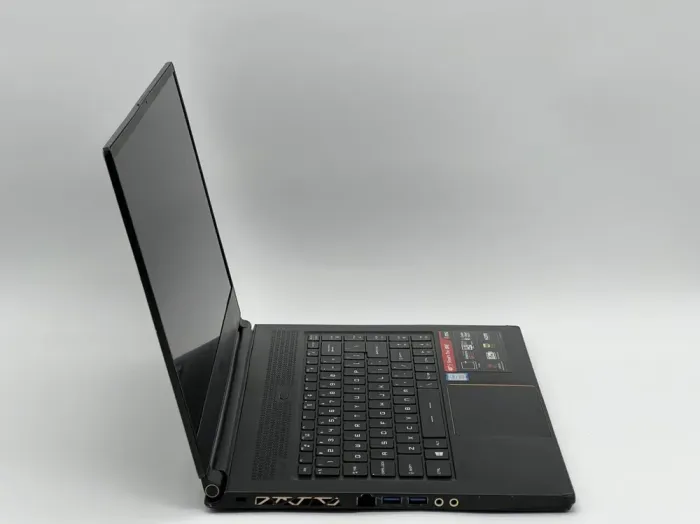 Ігровий ноутбук MSI GS65 Stealth Thin 8RE / 15.6" (1920x1080) IPS / Intel Core i7-8750H (6 (12) ядра по 2.2 - 4.1 GHz) / 16 GB DDR4 / 480 GB SSD / nVidia GeForce GTX 1060, 6 GB GDDR5, 192-bit / WebCam б/в - зображення 3