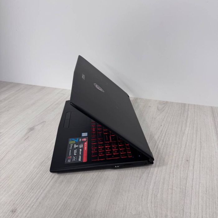 Ігровий ноутбук Б-класу MSI GL62M 7REX / 15,6" (1920x1080) TN / Intel Core i7-7700HQ (4 (8) ядра по 2,8 - 3,8 ГГц) / 16 ГБ DDR4 / 128 ГБ SSD NVMe + 1000 ГБ HDD / nVidia GeForce GTX 1050 Ti, 4 ГБ GDDR5, 128-біт / Веб-камера б/в - зображення 7