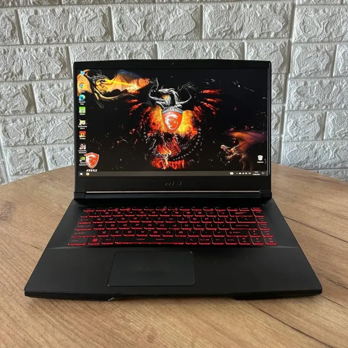 Ігровий ноутбук Б-клас MSI GF63 Thin 10SC / 15.6" (1920x1080) IPS / Intel Core i5-10500H (6 (12) ядер по 2.5 - 4.5 GHz) / 16 GB DDR4 / 256 GB SSD / nVidia GeForce GTX 1650 Max-Q, 4 GB GDDR6, 128-bit / WebCam б/в - зображення 2
