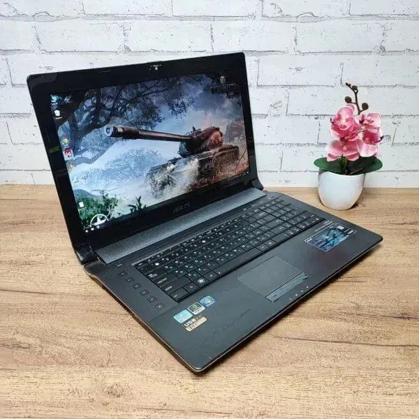 Ноутбук Asus N73S / 17.3" (1920x1080) TN / Intel Core i7-2630QM (4 (8) ядра по 2.0 - 2.9 GHz) / 8 GB DDR3 / 256 GB SSD + 320 GB HDD / nVidia GeForce GT 630M, 2 GB GDDR3, 128-bit / WebCam б/в - зображення 6