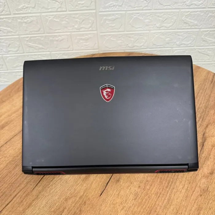 Ігровий ноутбук Б-клас MSI GL62M 7REX / 15.6" (1920x1080) TN / Intel Core i7-7700HQ (4 (8) ядра по 2.8 - 3.8 GHz) / 16 GB DDR4 / 256 GB SSD M.2 + 1000 GB HDD / nVidia GeForce GTX 1050 Ti, 4 GB GDDR5, 128-bit / WebCam б/в - зображення 3
