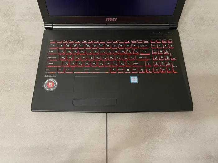 Ігровий ноутбук MSI GP62MVR 7RFX Leopard Pro / 15,6" (1920x1080) IPS / Intel Core i7-7700HQ (4 (8) ядра по 2,8 - 3,8 ГГц) / 16 ГБ DDR4 / 256 ГБ SSD + 1000 ГБ HDD / nVidia GeForce GTX 1060, 6 ГБ GDDR5, 192-біт / WebCam б/в - зображення 3
