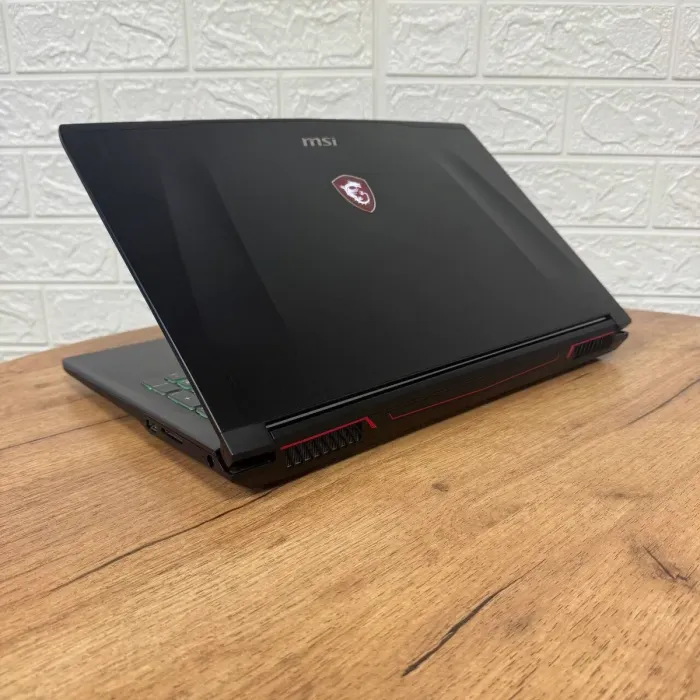 Ігровий ноутбук Б-клас MSI GF62VR 7RF Apache Pro / 15.6" (3840x2160) IPS / Intel Core i7-7700HQ (4 (8) ядра по 2.8 - 3.8 GHz) / 16 GB DDR4 / 128 GB SSD + 1000 GB HDD / nVidia GeForce GTX 1060, 6 GB GDDR5, 192-bit / WebCam б/в - зображення 6