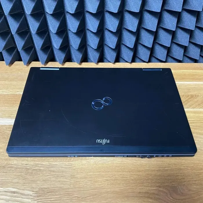 Ноутбук Fujitsu LifeBook E782 / 15.6" (1366x768) TN / Intel Core i5-3320M (2 (4) ядра по 2.6 - 3.3 GHz) / 8 GB DDR3 / 128 GB SSD / Intel HD Graphics 4000 / WebCam б/в - зображення 7