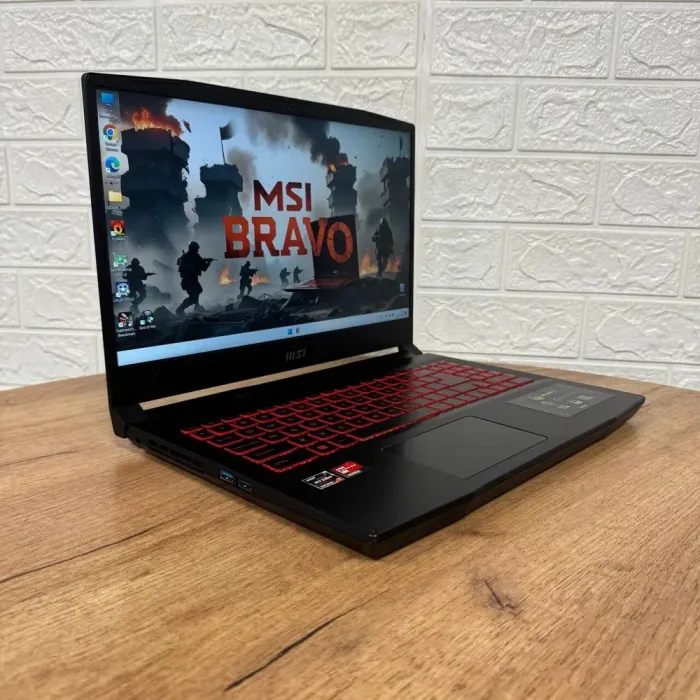 Ігровий ноутбук Б-клас MSI Bravo 15 B5ED / 15.6" (1920x1080) IPS / AMD Ryzen 7 5800H (8 (16) ядер по 3.2 - 4.4 GHz) / 16 GB DDR4 / 512 GB SSD NVMe / AMD Radeon RX 6550M, 4 GB GDDR6, 64-bit / WebCam б/в - зображення 4