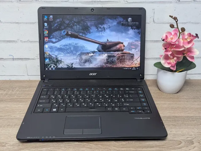 Ноутбук Б-клас Acer TravelMate P243 / 14" (1366x768) TN / Intel Core i3-3110M (2 (4) ядра по 2.4 GHz) / 8 GB DDR3 / 128 GB SSD / Intel HD Graphics 4000 / WebCam / DVD-ROM б/в - зображення 2