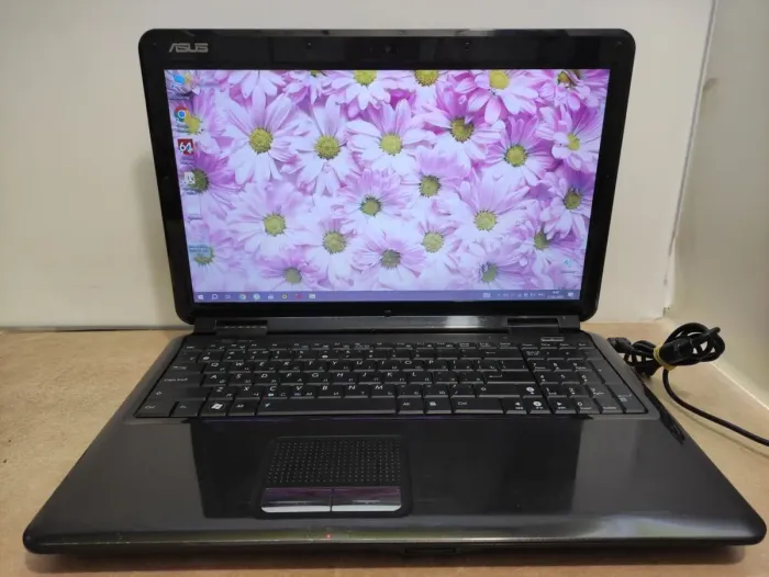 Ноутбук Asus K50IJ / 15.6" (1366x768) TN / Intel Celeron T3000 (2 ядра по 1.8 GHz) / 4 GB DDR2 / 120 GB SSD / Intel GMA 4500M HD Graphics / WebCam / АКБ не тримає б/в - зображення 6