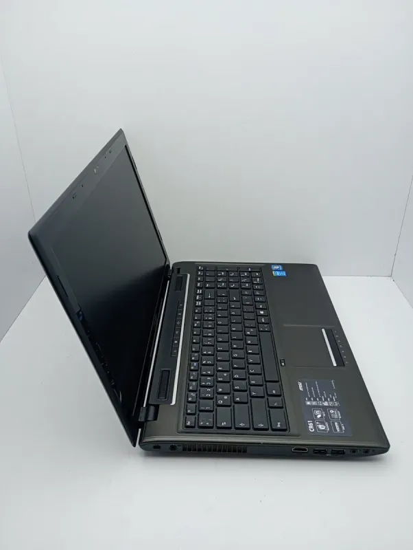 Ноутбук MSI CX61 / 15.6" (1600x900) TN / Intel Core i3-4100M (2 (4) ядра по 2.5 GHz) / 6 GB DDR3 / 120 GB SSD / Intel HD Graphics 4600 / WebCam б/в - зображення 5