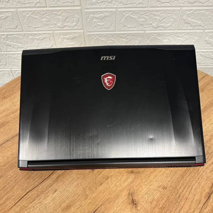 Ігровий ноутбук Б-клас MSI GE72VR 7RF Apache Pro / 17.3" (1920x1080) TN / Intel Core i7-7700HQ (4 (8) ядра по 2.8 - 3.8 GHz) / 16 GB DDR4 / 128 GB SSD M.2 + 1000 GB HDD / nVidia GeForce GTX 1060, 3 GB GDDR5, 192-bit / WebCam б/в - зображення 3