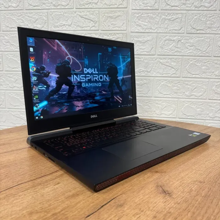 Ігровий ноутбук Б-класу Dell Inspiron 15 Gaming 7567 / 15.6" (1920x1080) IPS / Intel Core i5-7300HQ (4 ядра по 2,5 - 3,5 ГГц) / 16 ГБ DDR4 / 128 ГБ SSD M.2 + 1000 ГБ HDD / nVidia GeForce GTX 1050, 4 ГБ GDDR5, 128-bit / WebCam б/в - зображення 4