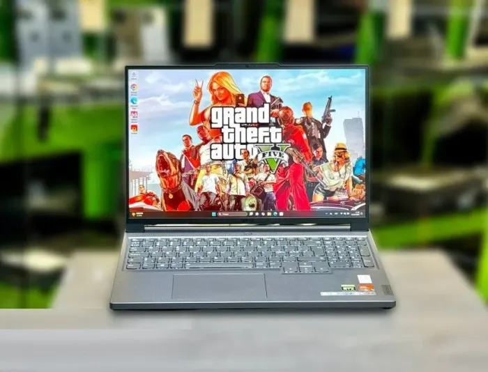 Ігровий ноутбук Lenovo Legion Slim 5 16APH8 / 16" (1920x1200) IPS / AMD Ryzen 7 7840HS (8 (16) ядер по 3.8 - 5.1 GHz) / 32 GB DDR5 / 512 GB SSD M.2 / nVidia GeForce RTX 4060, 8 GB GDDR6, 128-bit / WebCam / Win 11 Home б/в - зображення 2