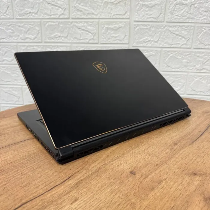Ігровий ноутбук Б-клас MSI GS65 Stealth 9SF / 15.6" (1920x1080) IPS / Intel Core i7-9750H (6 (12) ядер по 2.6 - 4.5 GHz) / 16 GB DDR4 / 512 GB SSD NVMe / nVidia GeForce RTX 2070 Max-Q, 8 GB GDDR6, 256-bit / WebCam б/в - зображення 6