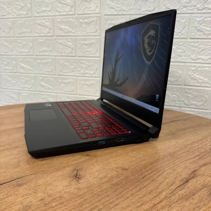 Ігровий ноутбук Б-клас MSI Katana GF66 11UE / 15.6" (1920x1080) IPS / Intel Core i7-11800H (8 (16) ядер по 2.3 - 4.6 GHz) / 16 GB DDR4 / 512 GB SSD / nVidia GeForce RTX 3060, 6 GB GDDR6, 192-bit / WebCam б/в - зображення 5