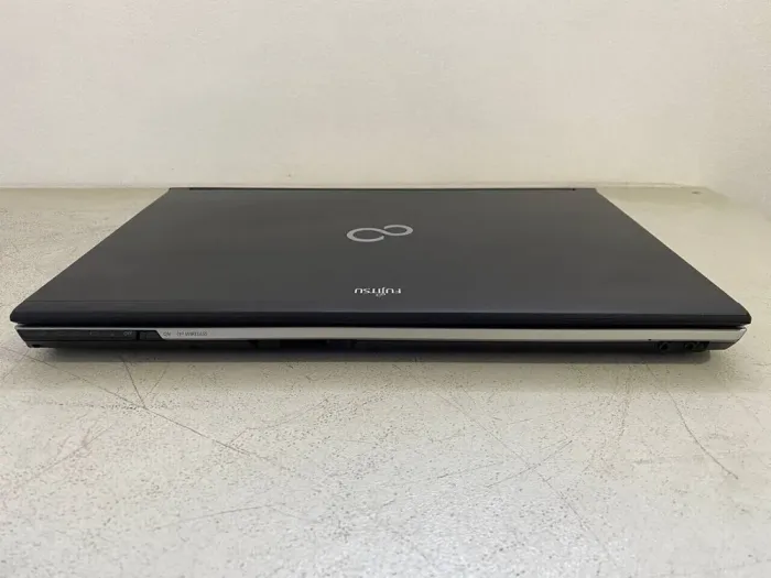 Мобільна робоча станція Fujitsu Celsius H720 / 15.6" (1920x1080) TN / Intel Core i7-3720QM (4 (8) ядра по 2.6 - 3.6 GHz) / 32 GB DDR3 / 256 GB SSD / nVidia Quadro K1000M, 2 GB GDDR3, 128-bit / WebCam б/в - зображення 5