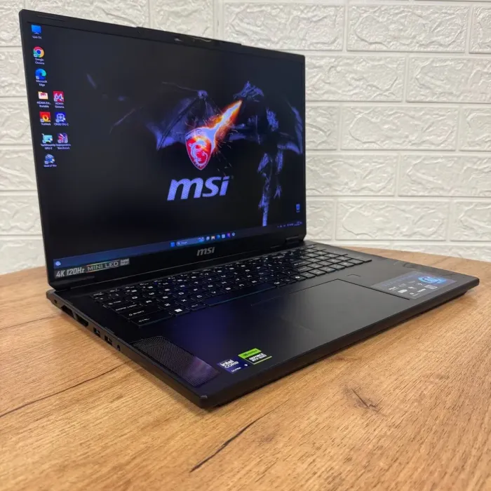Ігровий ноутбук MSI Stealth 18 AI Studio A1VHG / 18" (3840x2400) IPS / Intel Core Ultra 9 185H (16 (22) ядер по 1.8 - 5.1 GHz) / 32 GB DDR5 / 1000 GB SSD / nVidia GeForce RTX 4080, 12 GB GDDR6, 192-bit / WebCam б/в - зображення 4