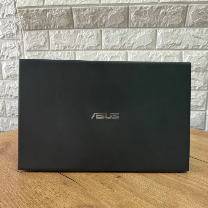 Ультрабук Б-клас Asus VivoBook F512DA / 15.6" (1920x1080) TN / AMD Ryzen 3 3200U (2 (4) ядра по 2.6 - 3.5 GHz) / 4 GB DDR4 / 256 GB SSD M.2 / AMD Radeon Vega 3 Graphics / WebCam б/в - зображення 3