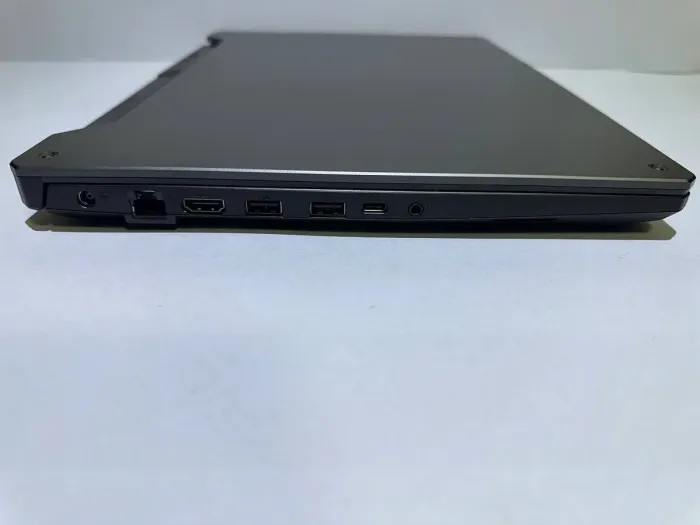 Ігровий ноутбук Asus TUF Gaming F15 FX506H / 15.6" (1920x1080) IPS / Intel Core i5-11400H (6 (12) ядер по 4.5 GHz) / 16 GB DDR4 / 512 GB SSD / nVidia GeForce RTX 3050 Ti, 4 GB GDDR6, 128-bit / WebCam б/в - зображення 6