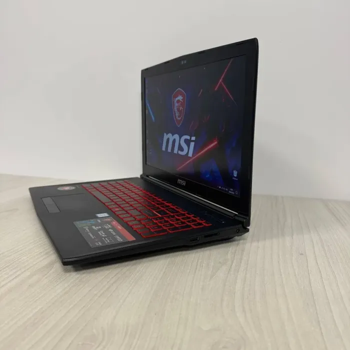 Ігровий ноутбук MSI GL62M 7REX / 15.6" (1920x1080) TN / Intel Core i7-7700HQ (4 (8) ядра по 2.8 - 3.8 GHz) / 16 GB DDR4 / 512 GB SSD M.2 / nVidia GeForce GTX 1050 Ti, 4 GB GDDR5, 128-bit / WebCam б/в - зображення 5