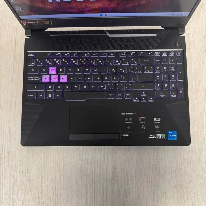 Ігровий ноутбук Asus TUF Gaming F15 FX506HCB / 15,6" (1920x1080) IPS / Intel Core i5-11400H (6 (12) ядер по 4,5 ГГц) / 16 ГБ DDR4 / 512 ГБ SSD M.2 NVMe / nVidia GeForce RTX 3050, 4 ГБ GDDR6, 128-біт / Без веб-камери б/в - зображення 4