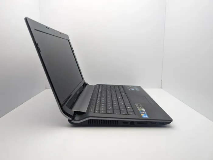 Ноутбук Asus N53Jn / 15.6" (1366x768) TN / Intel Core i5-450M (2 (4) ядра по 2.4 - 2.66 GHz) / 6 GB DDR3 / 500 GB HDD / nVidia GeForce GT 335M, 1 GB DDR3, 128-bit / WebCam б/в - зображення 5