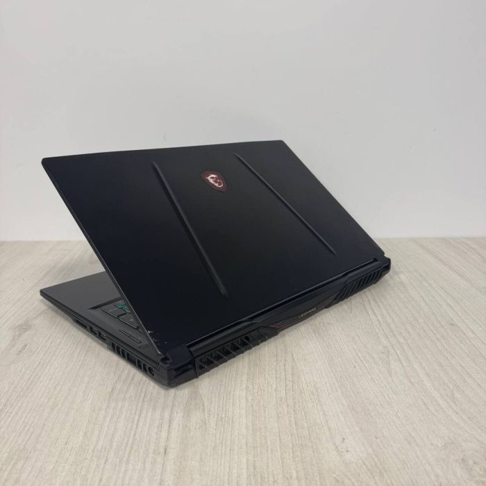 Ігровий ноутбук Б-класу MSI GL75 Leopard 10SFK / 17.3" (1920x1080) IPS / Intel Core i7-10750H (6 (12) ядер по 2.6 - 5.0 GHz) / 16 GB DDR4 / 1000 GB SSD / nVidia GeForce RTX 2070, 8 GB GDDR6, 256-bit / WebCam б/в - изображение 6