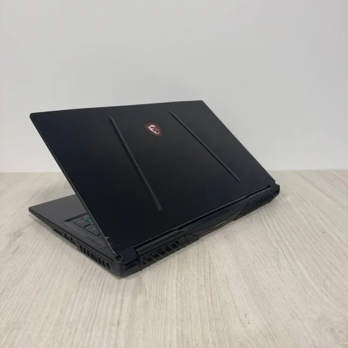 Ігровий ноутбук Б-класу MSI GL75 Leopard 10SFK / 17.3" (1920x1080) IPS / Intel Core i7-10750H (6 (12) ядер по 2.6 - 5.0 GHz) / 16 GB DDR4 / 1000 GB SSD / nVidia GeForce RTX 2070, 8 GB GDDR6, 256-bit / WebCam б/в - зображення 6