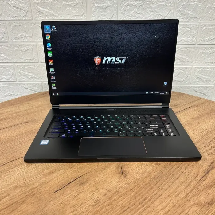 Ігровий ноутбук MSI GS65 Stealth 9SE / 15.6" (1920x1080) IPS / Intel Core i7-9750H (6 (12) ядер по 2.6 - 4.5 GHz) / 16 GB DDR4 / 512 GB SSD / nVidia GeForce RTX 2060, 6 GB GDDR6, 192-bit / WebCam б/в - зображення 2