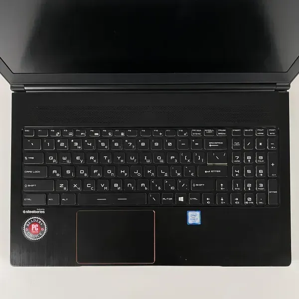 Ігровий ноутбук Б-клас MSI GS63VR 6RF / 15.6" (1920x1080) IPS / Intel Core i7-6700HQ (4 (8) ядра по 2.6 - 3.5 GHz) / 16 GB DDR4 / 128 GB SSD + 1000 GB HDD / nVidia GeForce GTX 1060, 6 GB GDDR5, 192-bit / WebCam / HDMI б/в - зображення 4