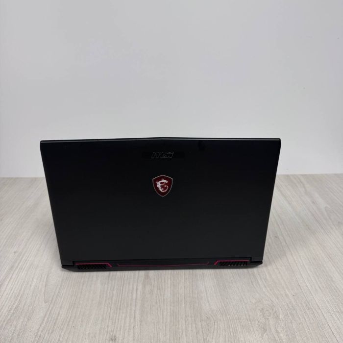 Ігровий ноутбук Б-класу MSI GL62M 7REX / 15,6" (1920x1080) TN / Intel Core i7-7700HQ (4 (8) ядра по 2,8 - 3,8 ГГц) / 16 ГБ DDR4 / 128 ГБ SSD NVMe + 1000 ГБ HDD / nVidia GeForce GTX 1050 Ti, 4 ГБ GDDR5, 128-біт / Веб-камера б/в - зображення 3