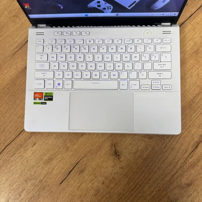 Ігровий ультрабук Б-клас Asus ROG Zephyrus G14 GA402XV / 14" (2560x1600) IPS / AMD Ryzen 9 7940HS (8 (16) ядер по 4.0 - 5.2 GHz) / 16 GB DDR5 / 512 GB SSD / nVidia GeForce RTX 4060, 8 GB GDDR6, 128-bit / WebCam б/в - зображення 7