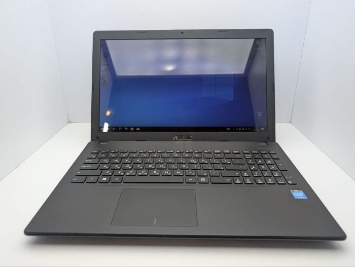 Ноутбук Asus R512M / 15.6" (1366x768) TN / Intel Celeron N2830 (2 ядра по 2.16 - 2.41 GHz) / 8 GB DDR3 / 128 GB SSD / Intel HD Graphics / WebCam б/в - зображення 2