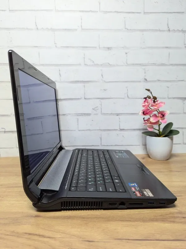 Ноутбук Asus N53T / 15.6" (1366x768) TN / AMD A6-3420M (4 ядра по 1.5 - 2.4 GHz) / 8 GB DDR3 / 256 GB SSD / AMD Radeon HD 7610M, 2 GB GDDR3, 128-bit / WebCam / DVD-ROM б/в - зображення 3