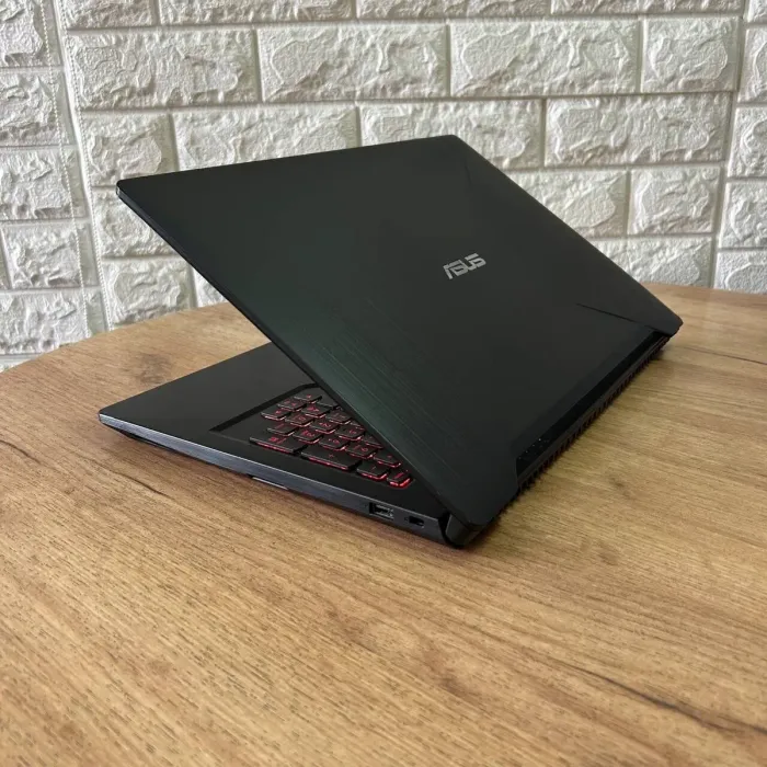 Ігровий ноутбук Б-клас Asus FX503VM / 15.6" (1920x1080) IPS / Intel Core i7-7700HQ (4 (8) ядра по 2.8 - 3.8 GHz) / 16 GB DDR4 / 128 GB SSD M.2 + 1000 GB HDD / nVidia GeForce GTX 1060, 3 GB GDDR5, 192-bit / WebCam б/в - зображення 6