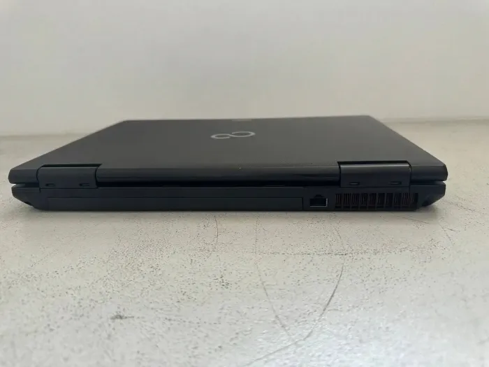 Ноутбук Б-клас Fujitsu LifeBook S752 / 14" (1366x768) TN / Intel Core i5-3340M (2 (4) ядра по 2.7 - 3.4 GHz) / 8 GB DDR3 / 120 GB SSD / Intel HD Graphics 4000 / WebCam / VGA б/в - зображення 8