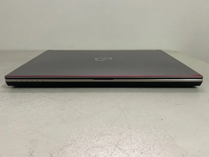 Мобільна робоча станція Fujitsu Celsius H760 / 15.6" (1920x1080) IPS / Intel Core i7-6820HQ (4 (8) ядра по 2.7 - 3.6 GHz) / 16 GB DDR4 / 256 GB SSD / nVidia Quadro M1000M, 2 GB GDDR5, 128-bit / WebCam / DVD-ROM б/в - зображення 6