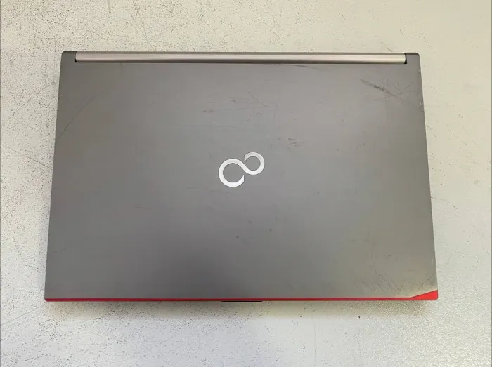 Мобільна робоча станція Fujitsu Celsius H730 / 15.6" (1920x1080) IPS / Intel Core i7-4810MQ (4 (8) ядра по 2.8 - 3.8 GHz) / 16 GB DDR3 / 256 GB SSD / nVidia Quadro K1100M, 2 GB GDDR5, 128-bit / WebCam / DVD-ROM б/в - зображення 7