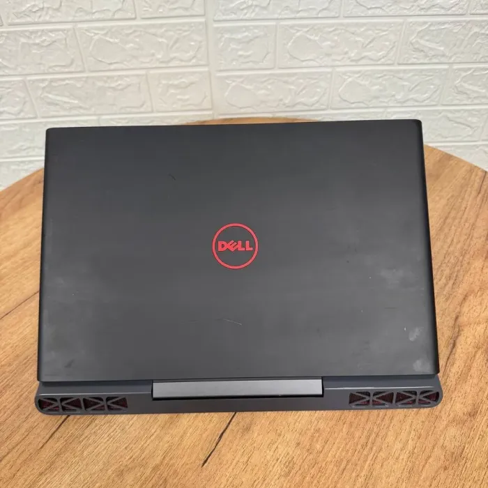 Ігровий ноутбук Б-класу Dell Inspiron 15 Gaming 7567 / 15.6" (1920x1080) IPS / Intel Core i5-7300HQ (4 ядра по 2,5 - 3,5 ГГц) / 16 ГБ DDR4 / 128 ГБ SSD M.2 + 1000 ГБ HDD / nVidia GeForce GTX 1050, 4 ГБ GDDR5, 128-bit / WebCam б/в - зображення 3