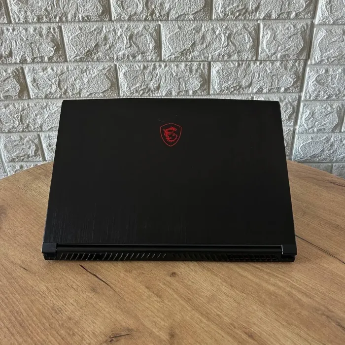 Ігровий ноутбук Б-клас MSI GF65 Thin 10UE / 15.6" (1920x1080) IPS / Intel Core i5-10500H (6 (12) ядер по 2.5 - 4.5 GHz) / 16 GB DDR4 / 512 GB SSD / nVidia GeForce RTX 3060, 6 GB GDDR6, 192-bit / WebCam б/в - зображення 3